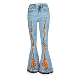 jean patte d'éléphant grande taille sur un cintre