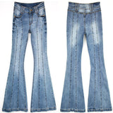 jean a patte d'elephant sur un cintre