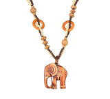 collier elephant bois